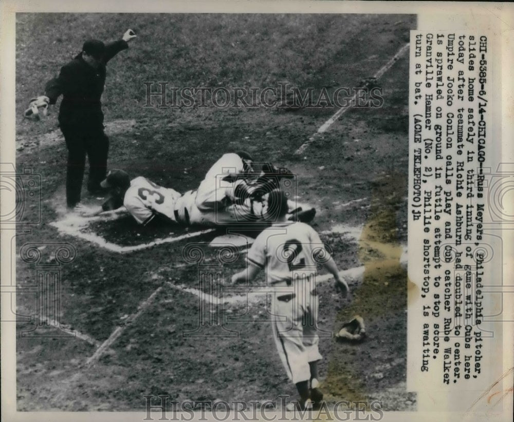 1949 Russ Meyers, Philadelphia Pitcher, slides home safely - Historic Images