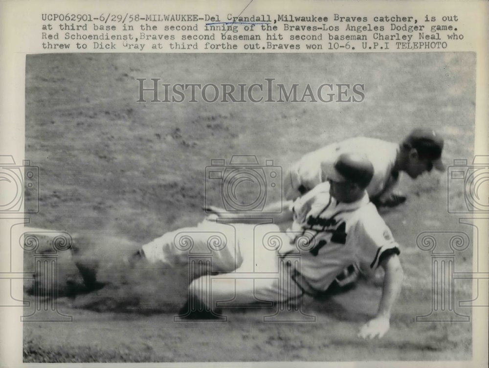 1958 Del Crandall of Milwaukee Braves catcher is out at 3rd base. - Historic Images