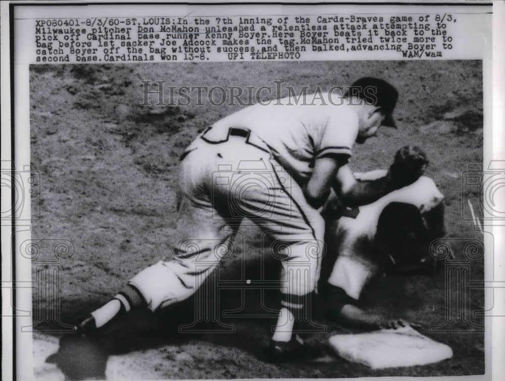 1960 Milwaukee Pitcher Don McMahon attempt to pick off Kenny Boyer. - Historic Images