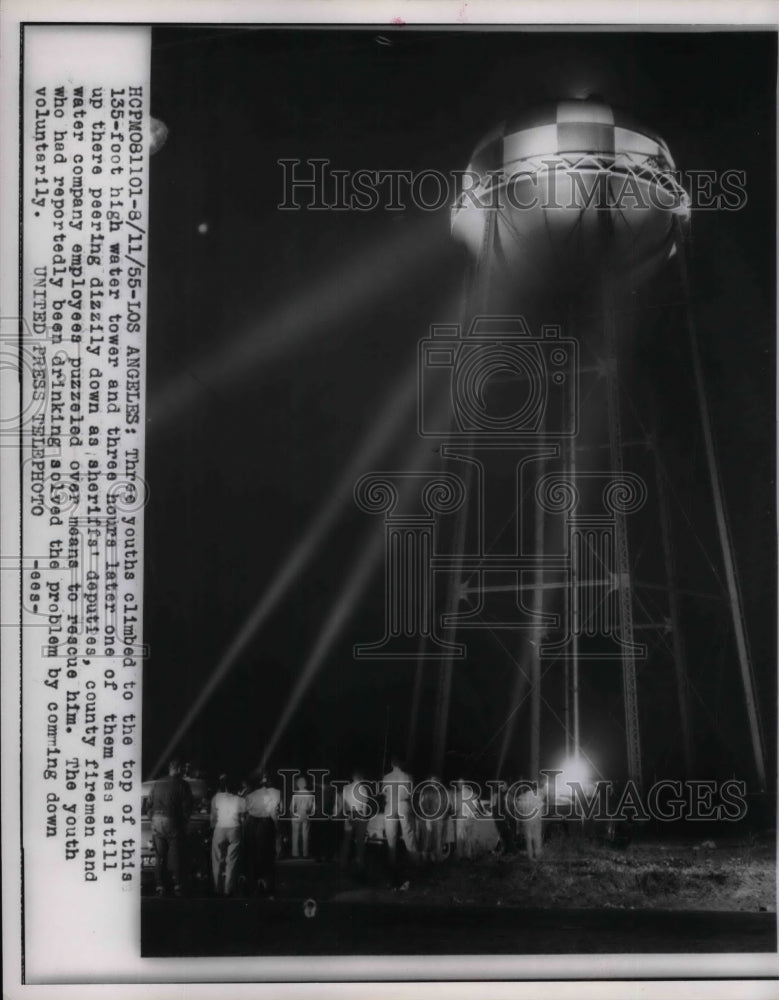 1955 Press Photo 3 youths on watertower in Los Angeles, Cal. - nea11229 - Historic Images
