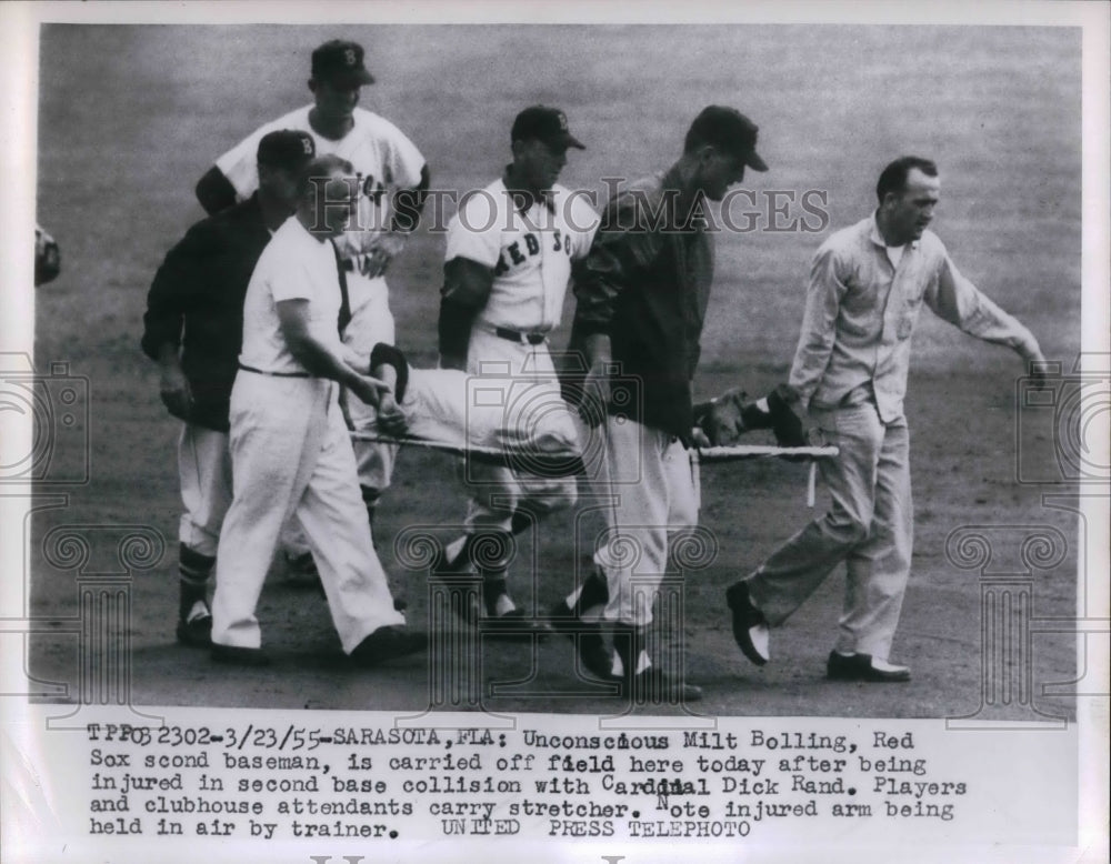 1955 Press Photo Boston Red Sox Second Baseman Milt Bolling Carried Off Field - Historic Images