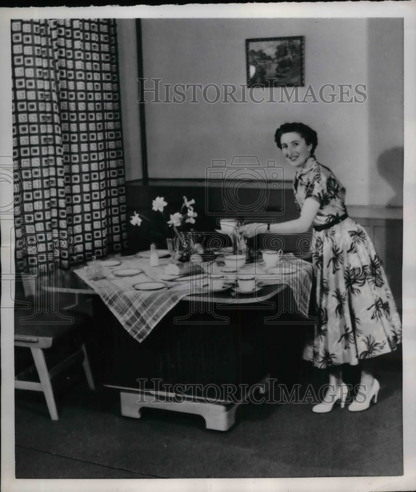 1954 Press Photo A new device that is a bed &amp; a table in one - nea19321-Historic Images