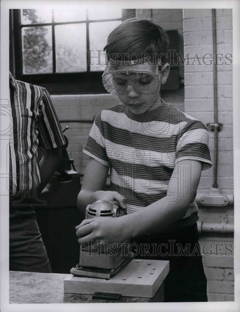 Press Photo Jim Harper, 12, sanding - nea19419 - Historic Images