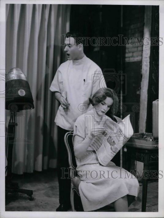 1960 Model having her hair worked on  - Historic Images