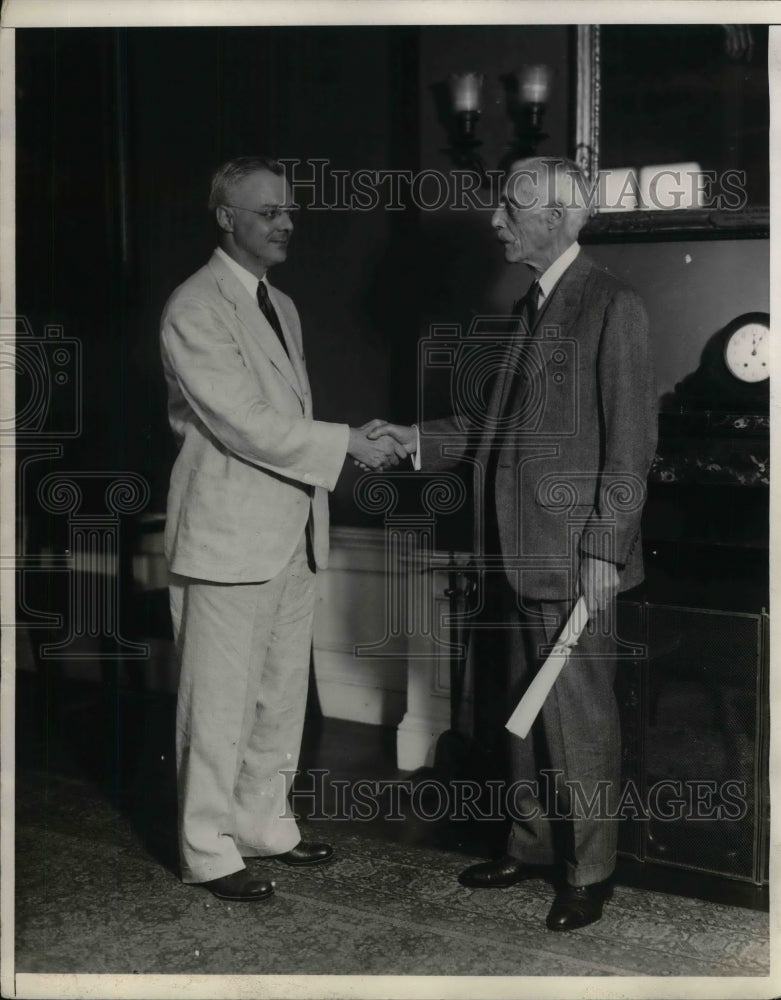 1930 Press Photo Internal Revenue Comm. David Burnett congratulated by Secretary - Historic Images