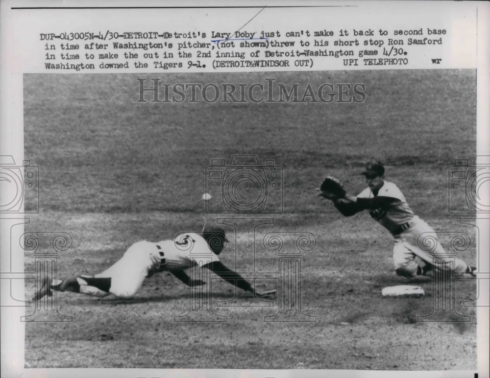 1959 Press Photo Tigers Lary Doby trapped at base by Washington Ron Samford. - Historic Images