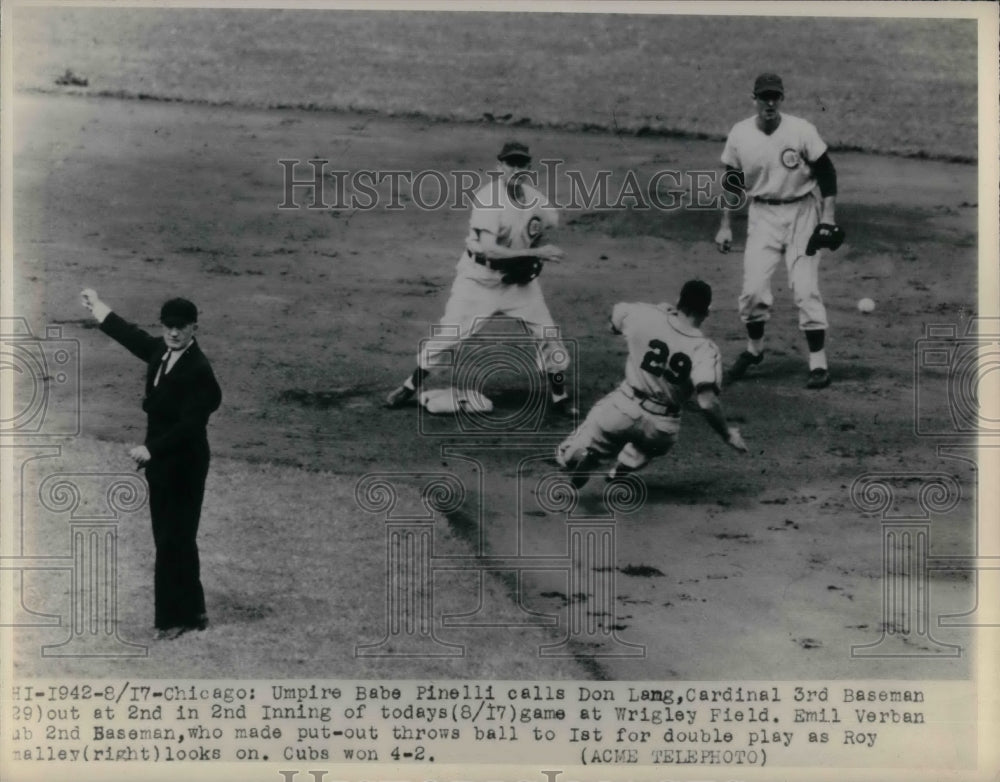 1948 Umpire Babe Pinelli calls for out at Cardinals Don Lang. - Historic Images
