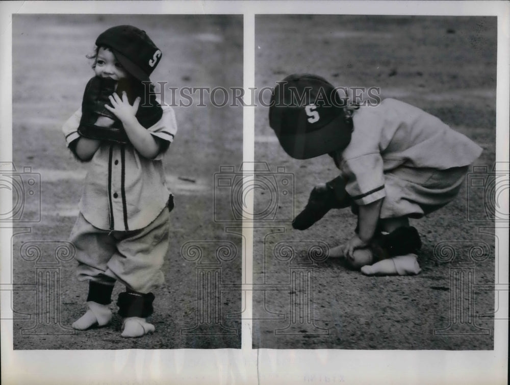 1962 2 Year old Kirstin Lea Williams picking up ball Robert Williams - Historic Images