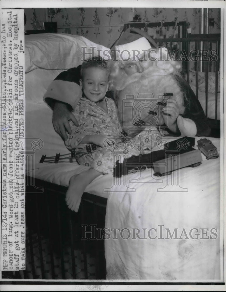 1956 Jesse Glatt Lung Cancer patient with Santa and electric train - Historic Images