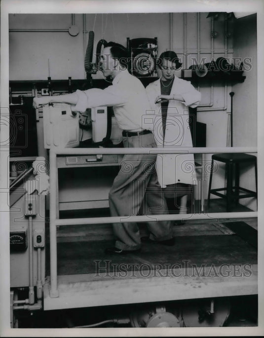 1954 Press Photo Suzanne Ewing Checks Patients Pulse During Treadmill Test - Historic Images