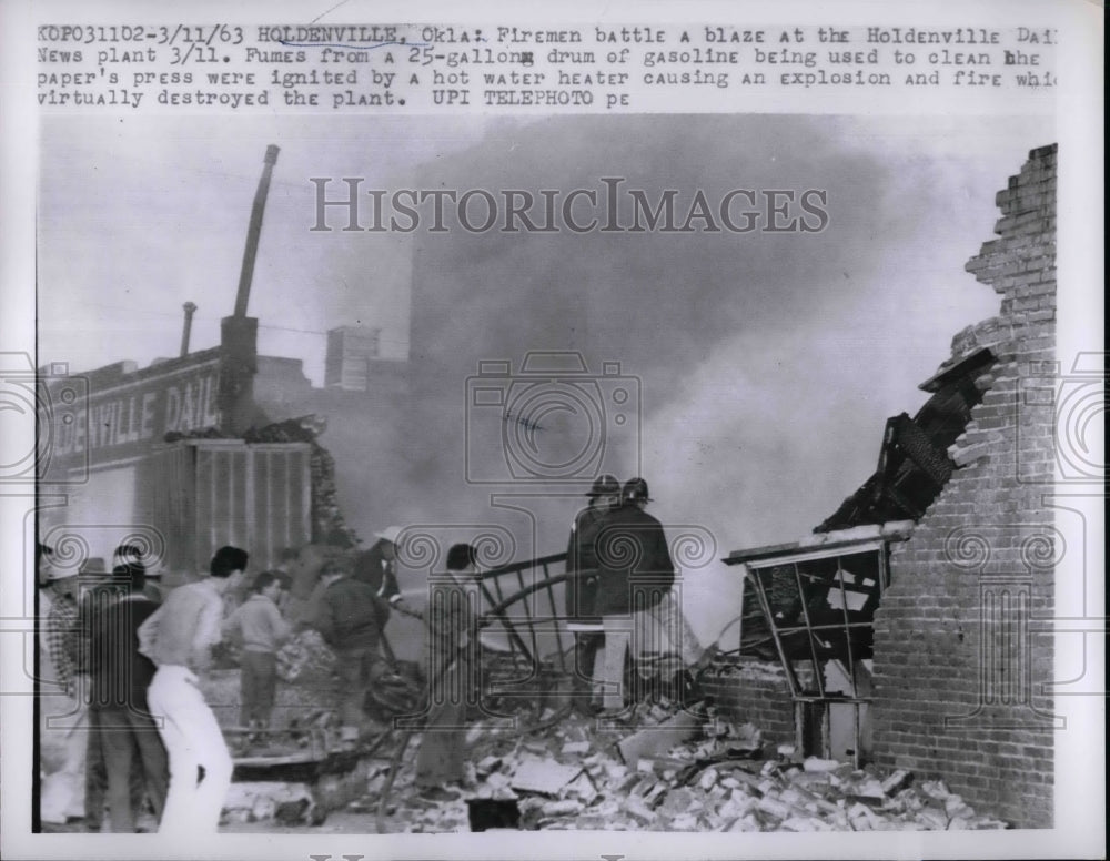 1963 Press Photo A building after a hot water heater exploded. igniting a drum - Historic Images