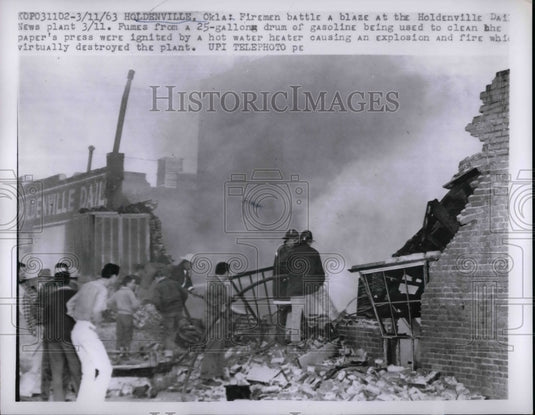 1963 Press Photo A building after a hot water heater exploded. igniting a drum - Historic Images