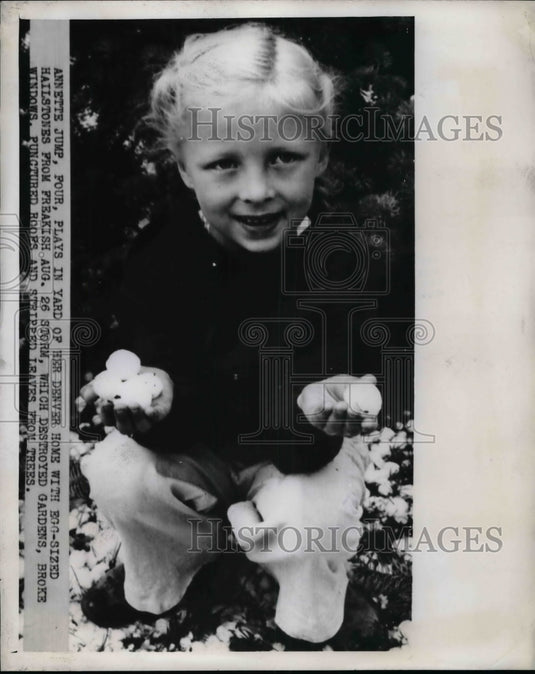 Annette Jump Age 4 Playing with Large Hailstones  - Historic Images