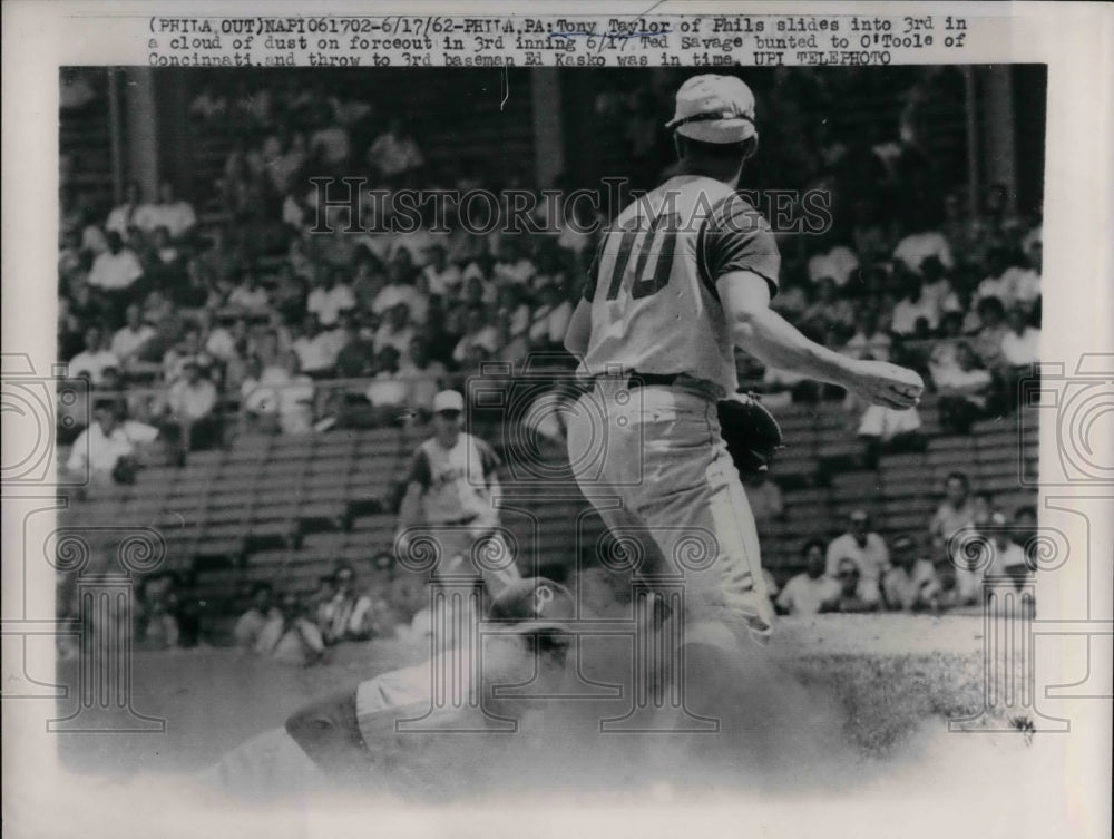 1962 Tony Taylor of Phils. slides at 3rd against Cincinnati Reds. - Historic Images