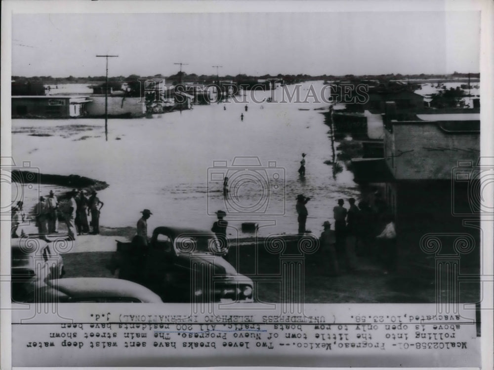 1958 Press Photo Nuevo Progresso main street boat traffic - nea25291 - Historic Images