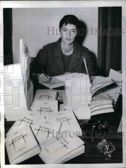 1959 Press Photo Annabel, Model Autographs her Book "Comme Tout Le Monde"-Historic Images