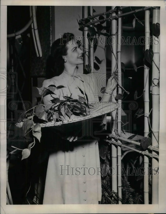 1941 Press Photo Three-in-one Hat, as a basket, it can hold its own - nea25684 - Historic Images