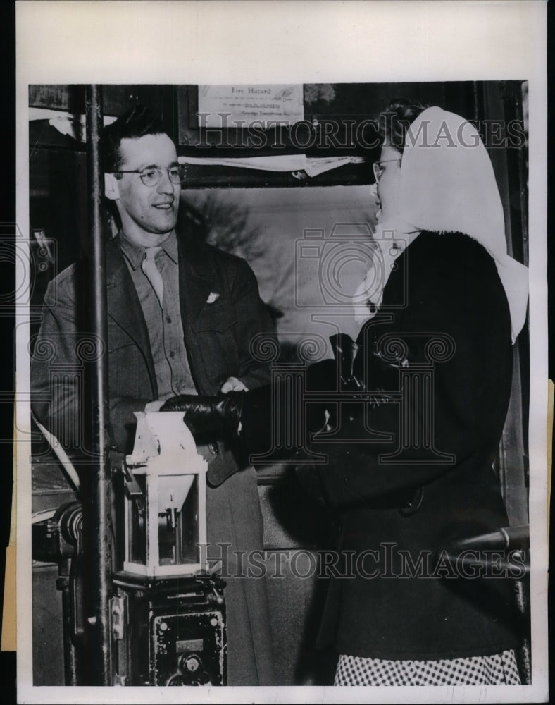 1946 Harold Miller working as trolley conductor during strike - Historic Images