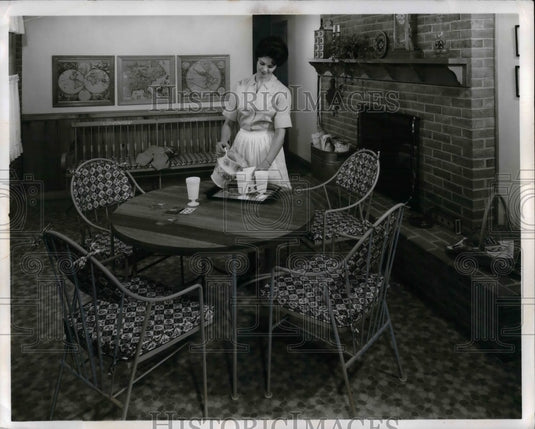 1963 Press Photo Homemaker Filling Glasses - nea26470 - Historic Images