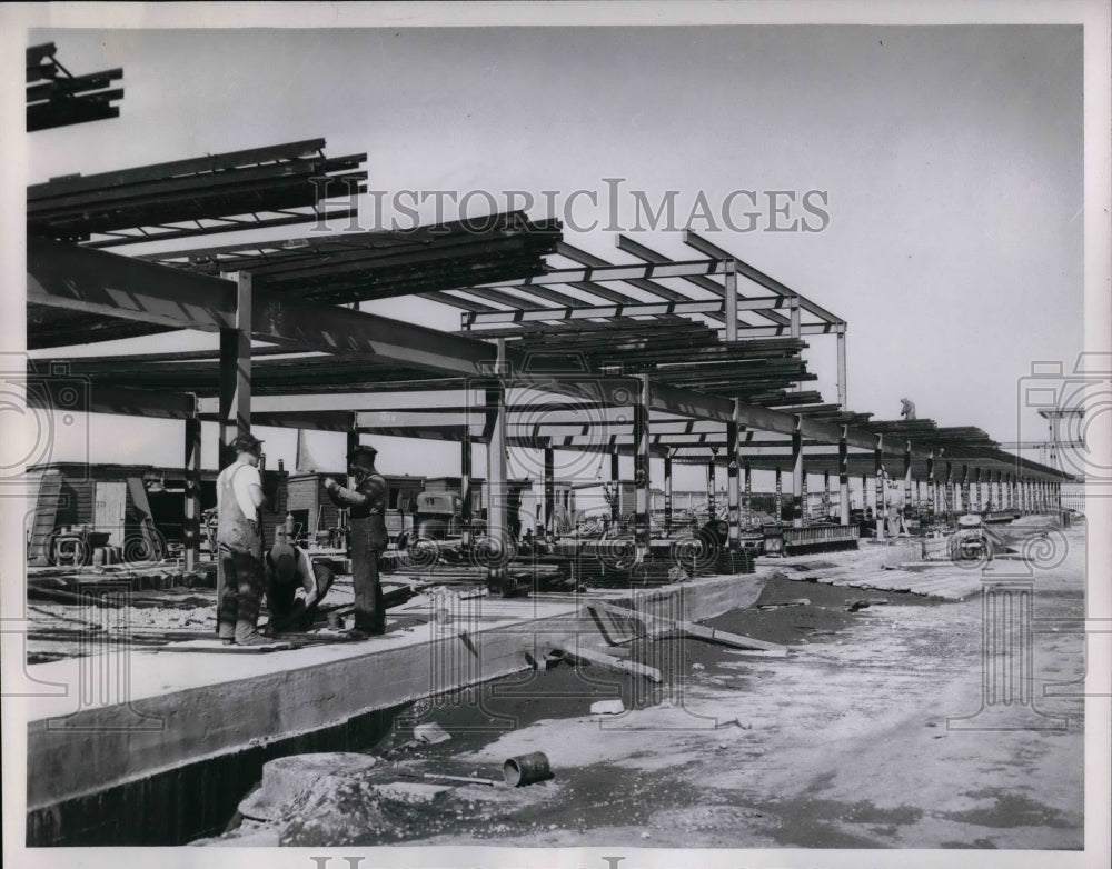 1953 Press Photo two workers at a construction site - nea26512 - Historic Images