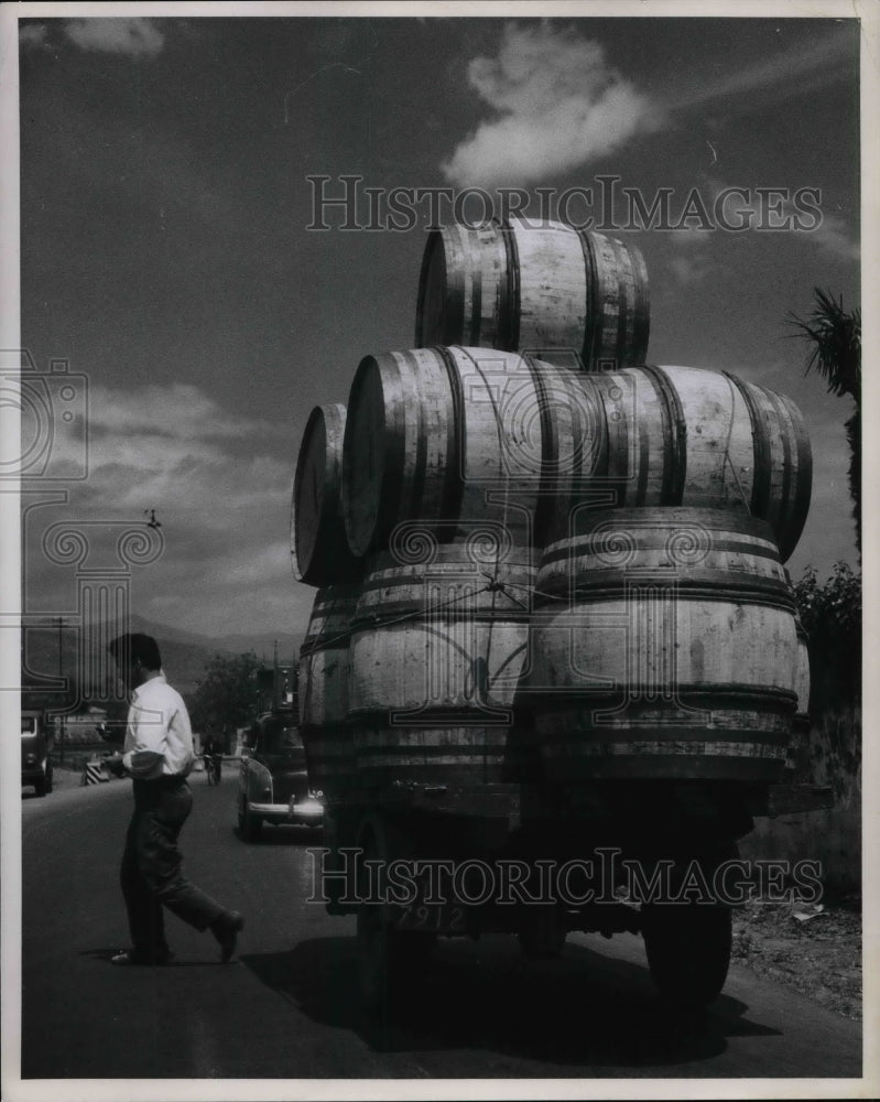 1954 Taormina, Italy. truck overloaded with barrells - Historic Images