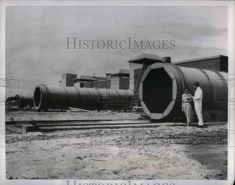 1951 40 ft long mufflers for jet engine testing in Canada - Historic Images