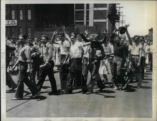 1937 Press Photo Strikers evacuate Apex Hosiery Mill due to court order-Historic Images