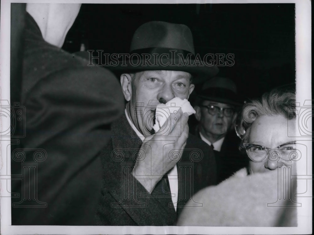 1958 Sen. Everett Dirksen uses handkerchief to stop nose bleed - Historic Images
