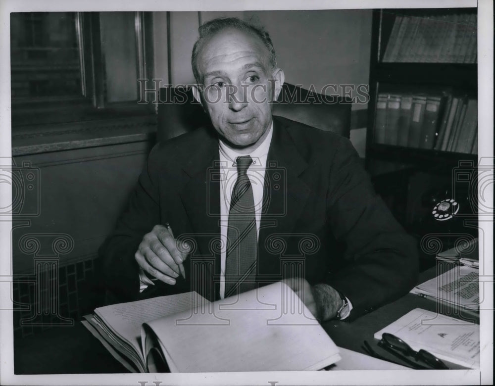 1952 Mr Leonard J. Ernmerglich at his desk  - Historic Images