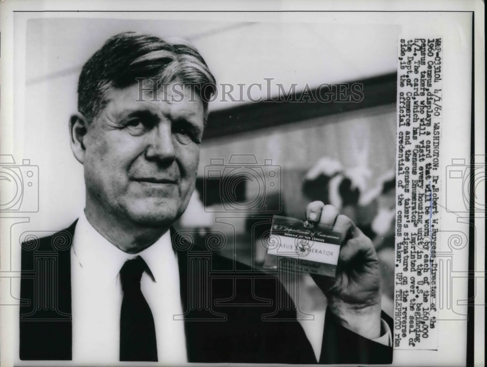 1960 Dr.Robert Burgess of Census, displayed a card worn by census. - Historic Images