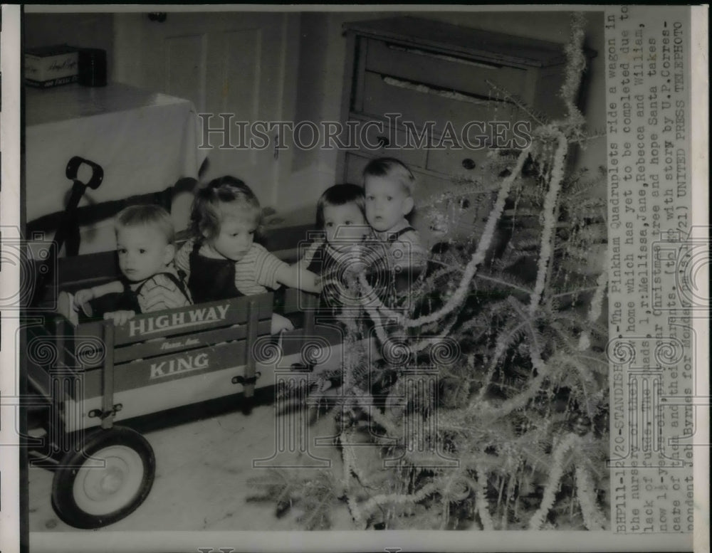1953 Press Photo Pinkham quadruplets in a wagon at 1 yr old - nea31232 - Historic Images