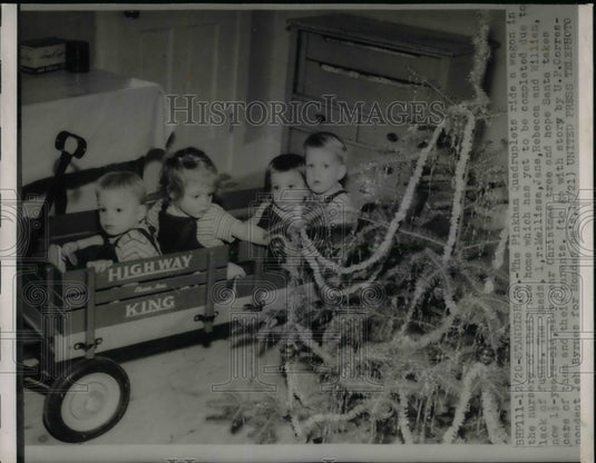 1953 Press Photo Pinkham quadruplets in a wagon at 1 yr old - nea31232 - Historic Images