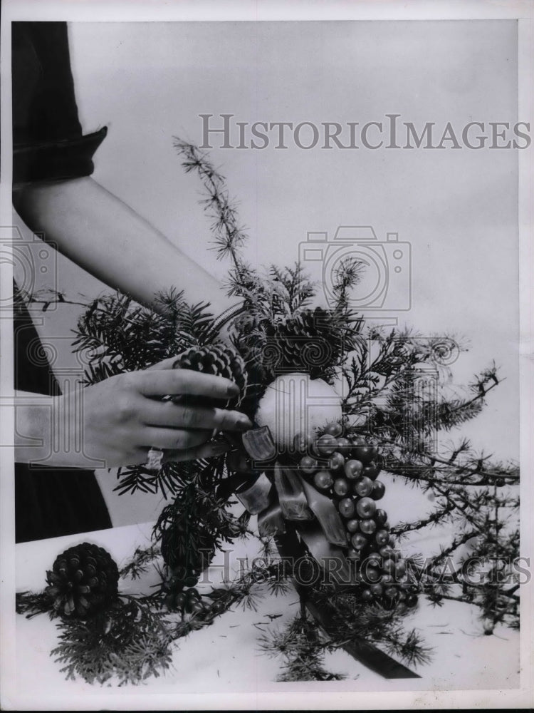 1953 Press Photo Christmas Pine Cone, Greenery Arrangement - nea31279 - Historic Images