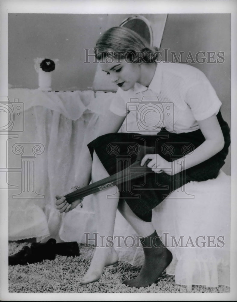 1953 Press Photo Putting on Stockings - nea31326 - Historic Images