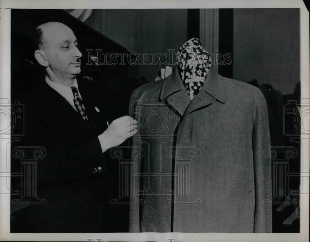 1945 Press Photo Clothing designer Grigori samarov & man's topcoat - nea31952 - Historic Images