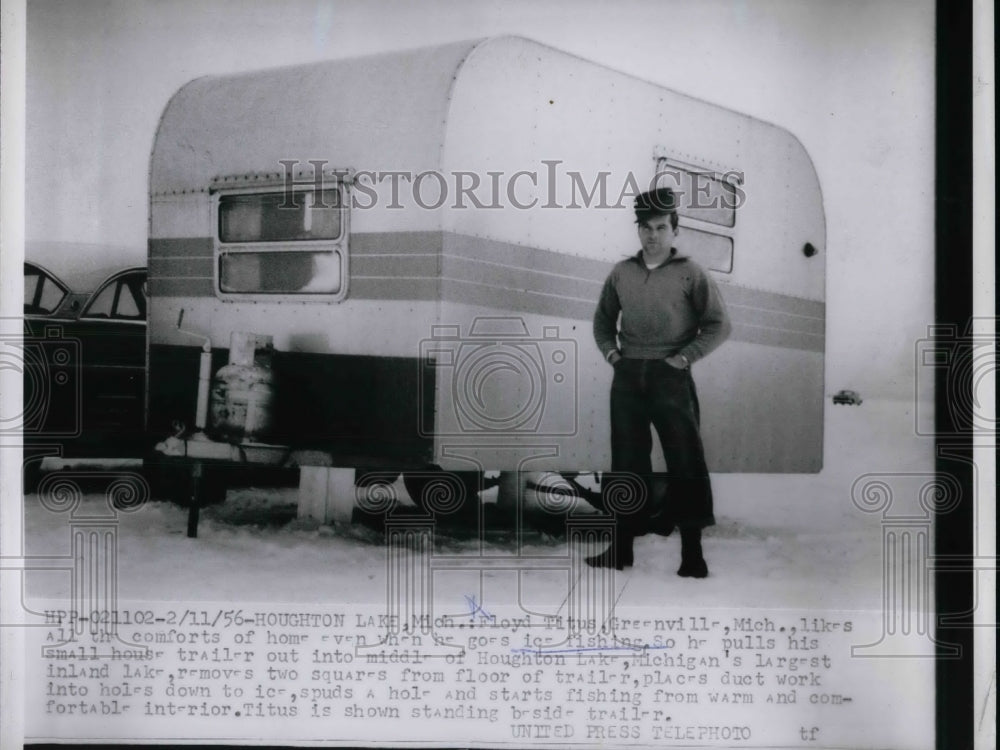 1956 Press Photo Floyd Titus beside his trailer at Houghton Lake, Michigan - Historic Images