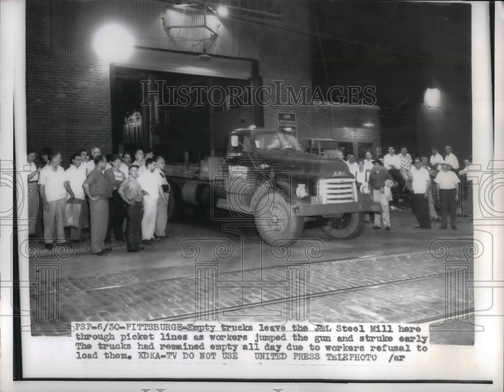1955 Empty truck leave J&L Steel Mill and Employees picket outside. - Historic Images