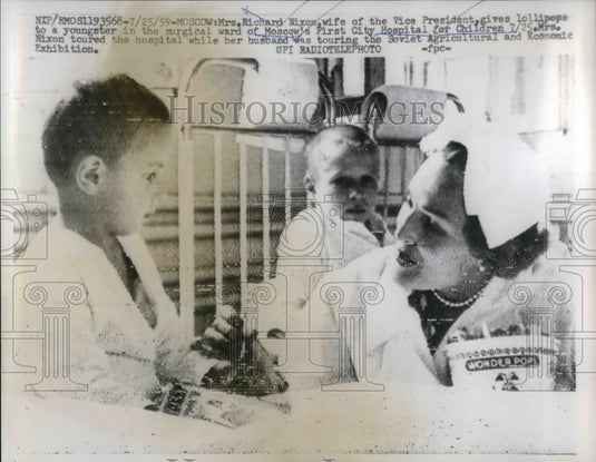 1959 Mrs Richard Nixon Gives Lollypop To Children In Moscow Hospital - Historic Images