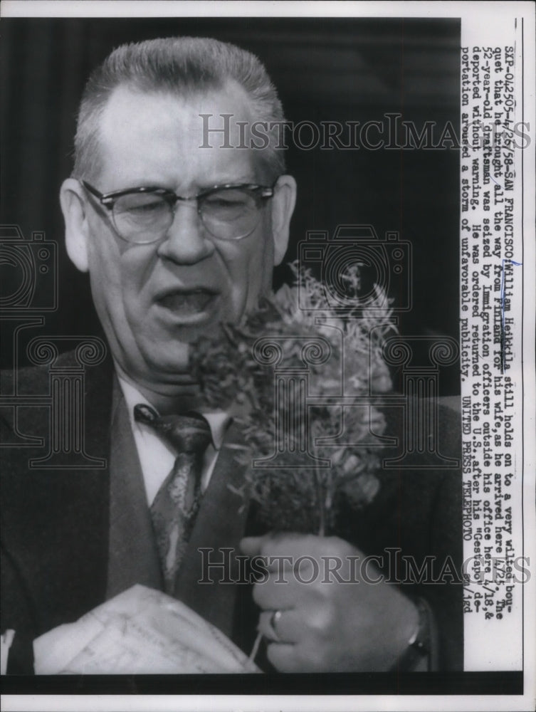 1958 Press Photo William Heikkila, With Wilted Flowers from Finland and Deported-Historic Images