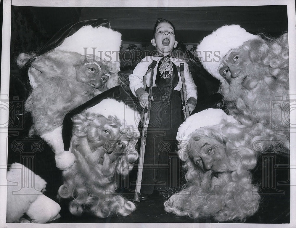 1952 Press Photo George Redmond &amp; several Santa Clauses in NYC - nea35679 - Historic Images
