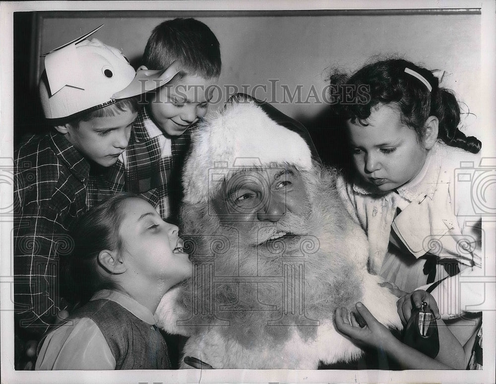 1956 Santa Claus in NYC with, L Ritter,J Blair,M Fried,R Gustein - Historic Images