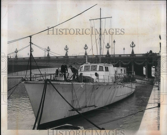 1947 Marcel Baudouy and family make home out of British war boat - Historic Images