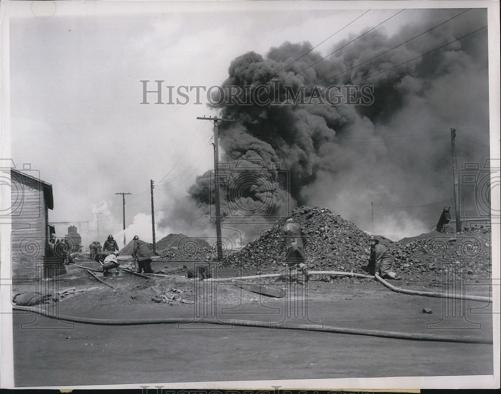 1951 Press Photo Firefighters Battle Coal Fire After Explosion In Hammond, IN - Historic Images