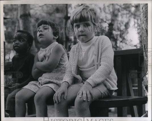 Patricia Arrington, Barbara Hipps, Ann Martin visit a farm - Historic Images