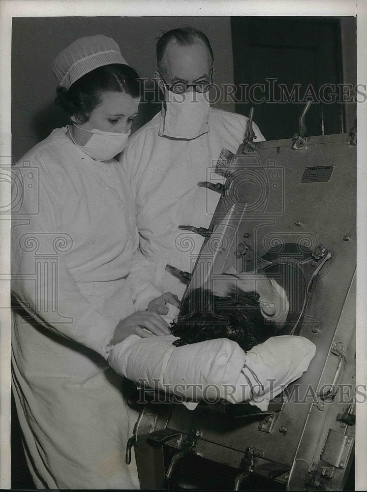 1937 James Helmer Receive Iron Lung, Lucile Bosley, Dr. P.A. Helmer - Historic Images