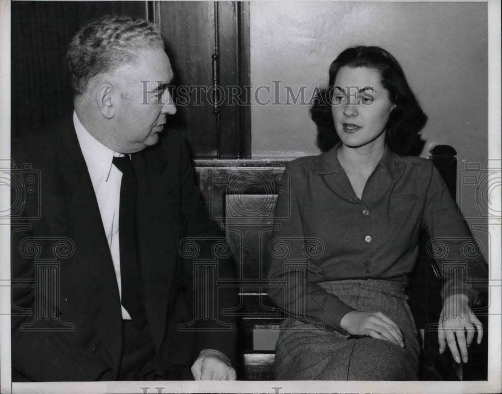 1951 Peggy Ellsworth, Miss Michigan of 1947, quizzed by Lt. Healy - Historic Images