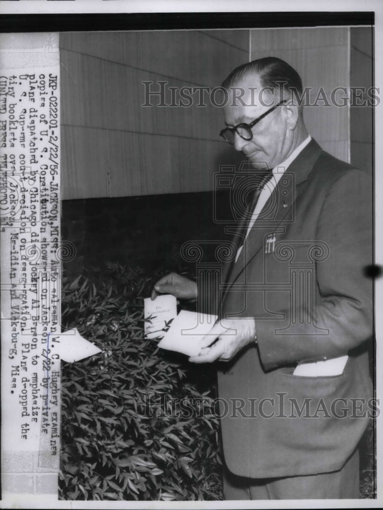 1956 Press Photo Auto Salesman W.C. Hughey Examines US Consitition - nea37931 - Historic Images