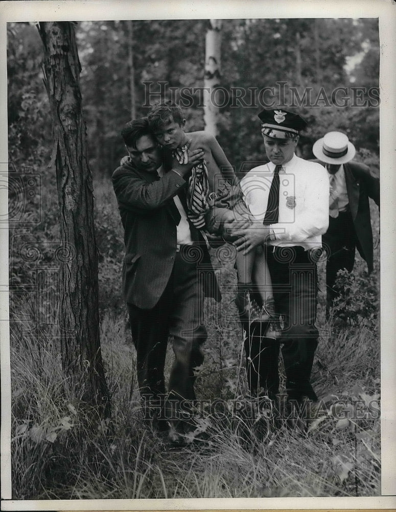 1943 9 Year Old Johnny Buchanan Carried By Police  - Historic Images