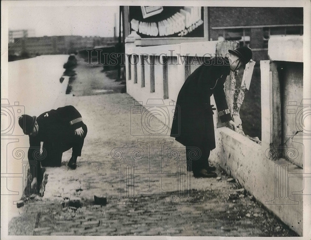 1939 London police inspect acqueduct after IRA terrorist bombing - Historic Images