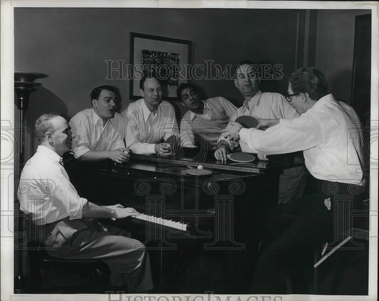 1948 American Artist sings together after a table Tennis Game. - Historic Images